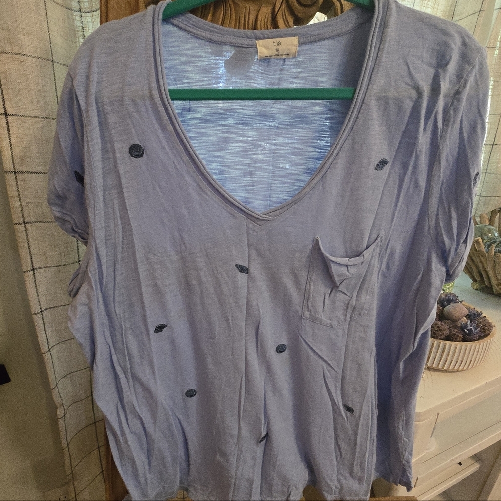 Light Blue Women's Top with Pocket Detail